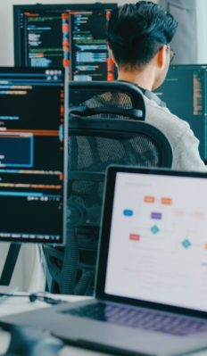 A woman checking an AI project on a computer